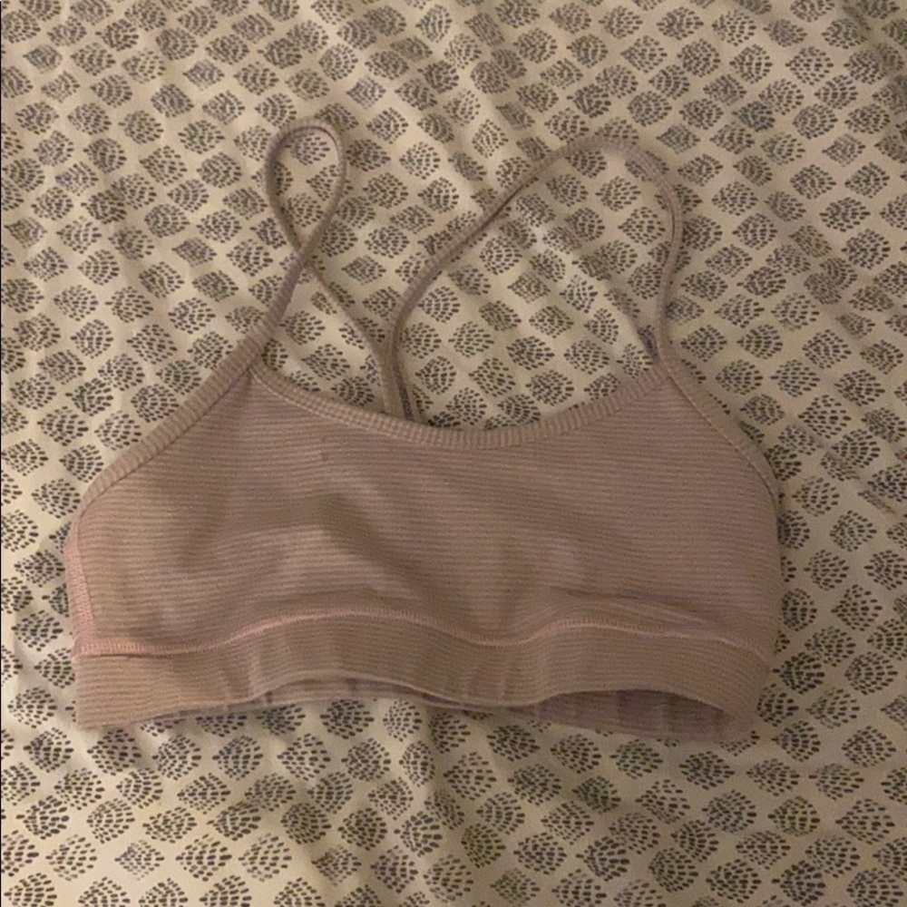 Pink and gray striped Lululemon sports bra